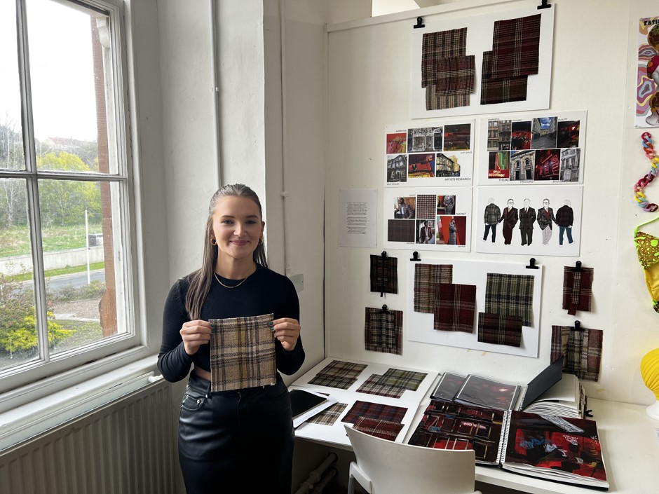 Student Lois Cowie with her winning textile design